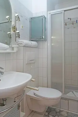 Ein Badezimmer in der Unterkunft Fischerhus, Whg 1