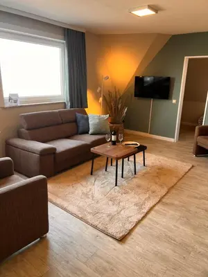 Ein Sitzbereich in der Unterkunft Haus Nige Wark - Ferienwohnungen