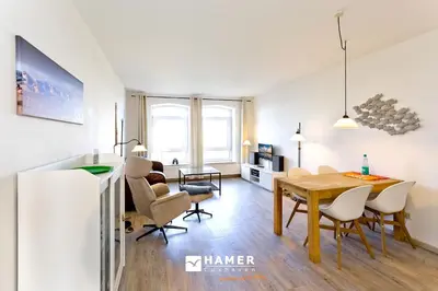 Ein Sitzbereich in der Unterkunft Am Seedeich 17, AS177