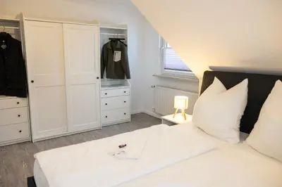 Ein Bett oder Betten in einem Zimmer der Unterkunft Neu renoviertes Luxus Penthouse mit Dachterrasse und Parkplatz in Bestlage