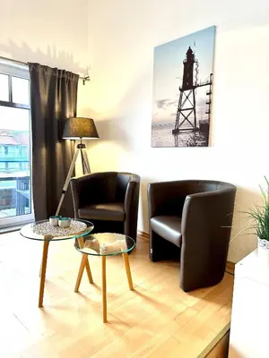 Ein Sitzbereich in der Unterkunft Ferienwohnung De Keel