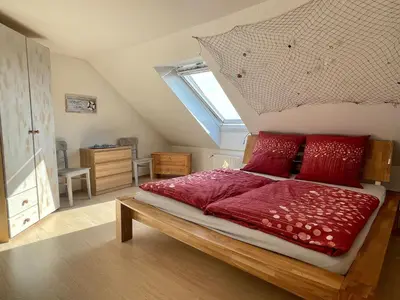 Ein Bett oder Betten in einem Zimmer der Unterkunft Ferienwohnung De Keel