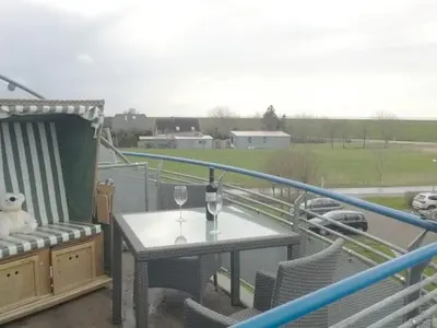 Ein Balkon oder eine Terrasse in der Unterkunft Ferienwohnung De Schuufut