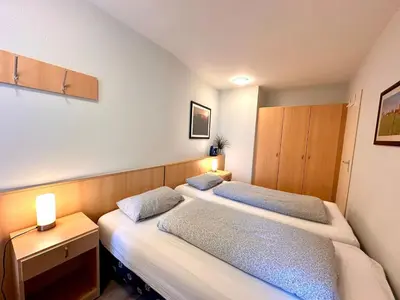 Ein Bett oder Betten in einem Zimmer der Unterkunft Ferienwohnung De Dwarslöper