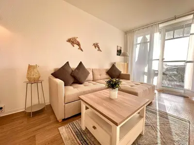 Ein Sitzbereich in der Unterkunft Ferienwohnung De Diek 103