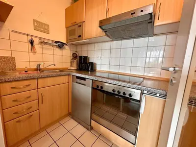 Küche/Küchenzeile in der Unterkunft Ferienwohnung De Diek 103