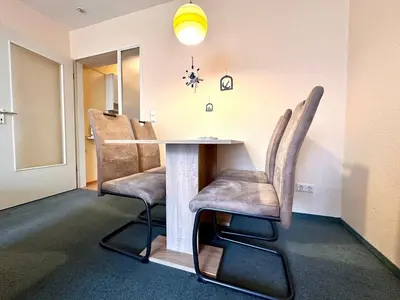 Ein Sitzbereich in der Unterkunft Ferienwohnung De Diek 105