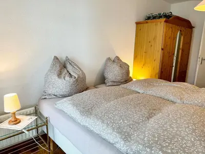 Ein Bett oder Betten in einem Zimmer der Unterkunft Ferienwohnung De Dörsch