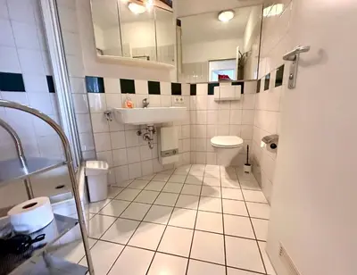 Ein Badezimmer in der Unterkunft Ferienwohnung De Dörsch