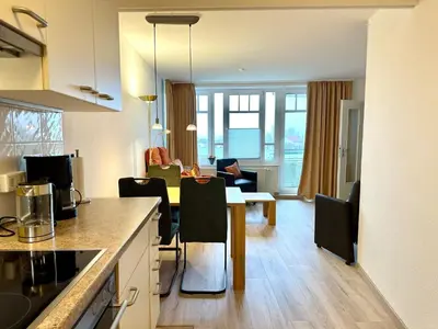Ein Sitzbereich in der Unterkunft Ferienwohnung De Lachmööv