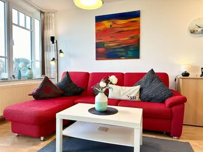 Ein Sitzbereich in der Unterkunft Ferienwohnung De Ligger