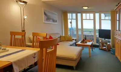 Ein Sitzbereich in der Unterkunft Ferienwohnung De Snieder