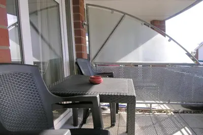 Ein Sitzbereich in der Unterkunft Ferienwohnung De Krabb