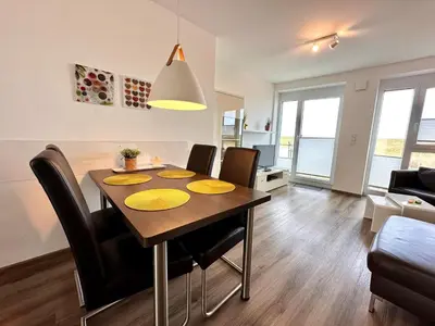 Ein Sitzbereich in der Unterkunft Ferienwohnung de Gleemfisk