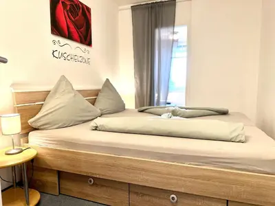 Ein Bett oder Betten in einem Zimmer der Unterkunft Ferienwohnung De Priel