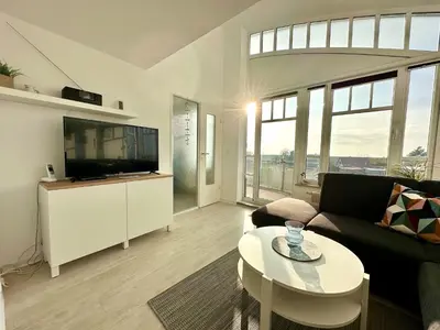 Ein Sitzbereich in der Unterkunft Ferienwohnung De Duuv