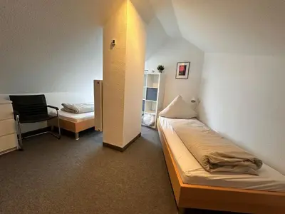 Ein Bett oder Betten in einem Zimmer der Unterkunft Ferienwohnung De Duuv