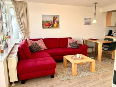 Ein Sitzbereich in der Unterkunft Ferienwohnung De Robb