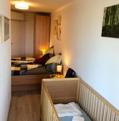 Ein Bett oder Betten in einem Zimmer der Unterkunft Ferienwohnung De Robb