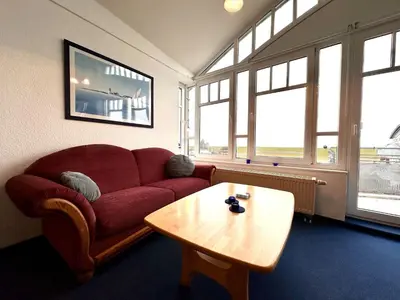 Ein Sitzbereich in der Unterkunft Ferienwohnung De Düker