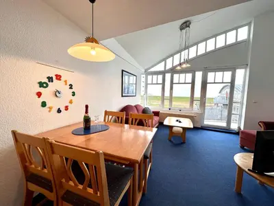 Ein Sitzbereich in der Unterkunft Ferienwohnung De Düker