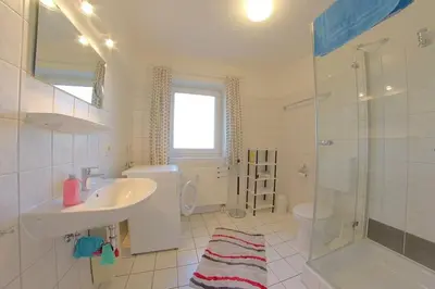 Ein Badezimmer in der Unterkunft DW10a FeWo Pottkieker