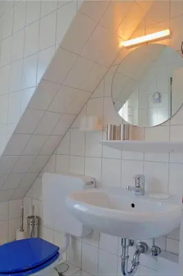 Ein Badezimmer in der Unterkunft SI30v FeWo Stör