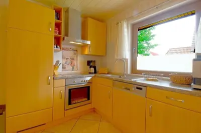 Küche/Küchenzeile in der Unterkunft KW21 Blockhaus am Meer