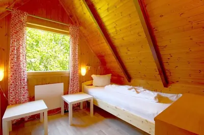 Ein Bett oder Betten in einem Zimmer der Unterkunft SE Opi-Huck-Stroot 13