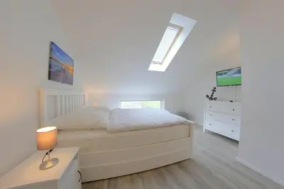 Ein Bett oder Betten in einem Zimmer der Unterkunft KW4a Haus Leni