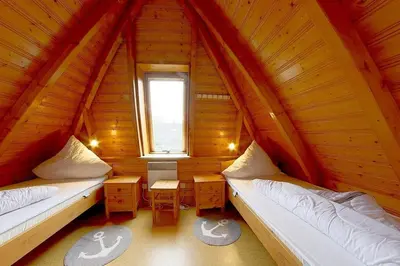 Ein Bett oder Betten in einem Zimmer der Unterkunft SV2 Opi-Huck 29
