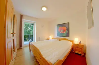 Ein Bett oder Betten in einem Zimmer der Unterkunft Lilli Marleen WE 26