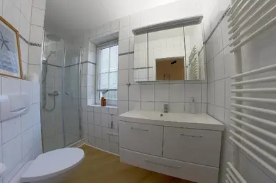 Ein Badezimmer in der Unterkunft KW16-01 Haus Sonnenstrahl