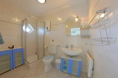 Ein Badezimmer in der Unterkunft KI 22 Haus Seeadler WE 15