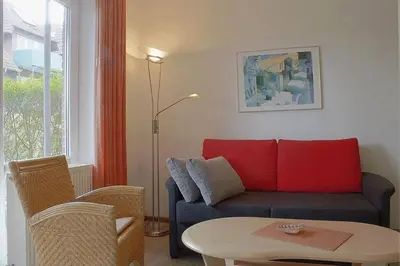 Ein Sitzbereich in der Unterkunft Haus Amrum WE 06