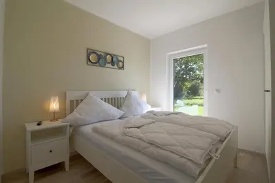 Ein Bett oder Betten in einem Zimmer der Unterkunft KW6 Haus Weitblick