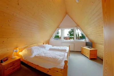Ein Bett oder Betten in einem Zimmer der Unterkunft SR Ostertill 8