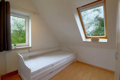 Ein Bett oder Betten in einem Zimmer der Unterkunft Sie4-03