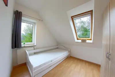 Ein Bett oder Betten in einem Zimmer der Unterkunft Sie4-03