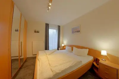 Ein Bett oder Betten in einem Zimmer der Unterkunft KD12-48 Kajediek