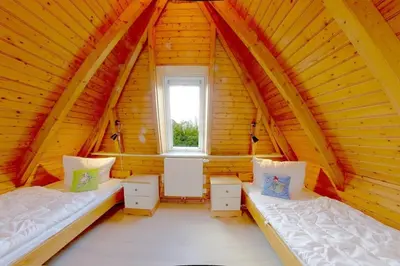 Ein Bett oder Betten in einem Zimmer der Unterkunft SV2 Opi-Huck 21