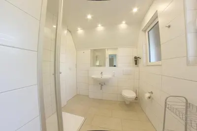 Ein Badezimmer in der Unterkunft SV2 Opi-Huck 21