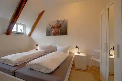 Ein Bett oder Betten in einem Zimmer der Unterkunft AO Hof Imsum - 04