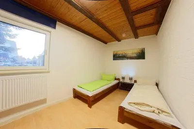 Ein Bett oder Betten in einem Zimmer der Unterkunft Dat lütte Hus