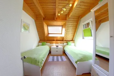 Ein Bett oder Betten in einem Zimmer der Unterkunft SV3 Wittsand 24 Meer-Zeit