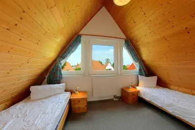 Ein Bett oder Betten in einem Zimmer der Unterkunft SR Westertill 31 Lucie