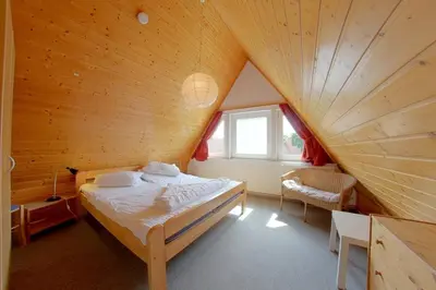 Ein Bett oder Betten in einem Zimmer der Unterkunft SR Westertill 31 Lucie