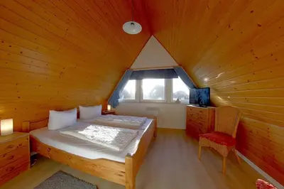 Ein Bett oder Betten in einem Zimmer der Unterkunft SR Nordertill 7