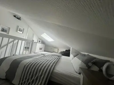 Ein Bett oder Betten in einem Zimmer der Unterkunft LT35a Haus Sternengucker
