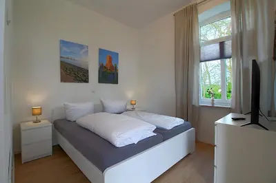 Ein Bett oder Betten in einem Zimmer der Unterkunft AO Hof Imsum - 01